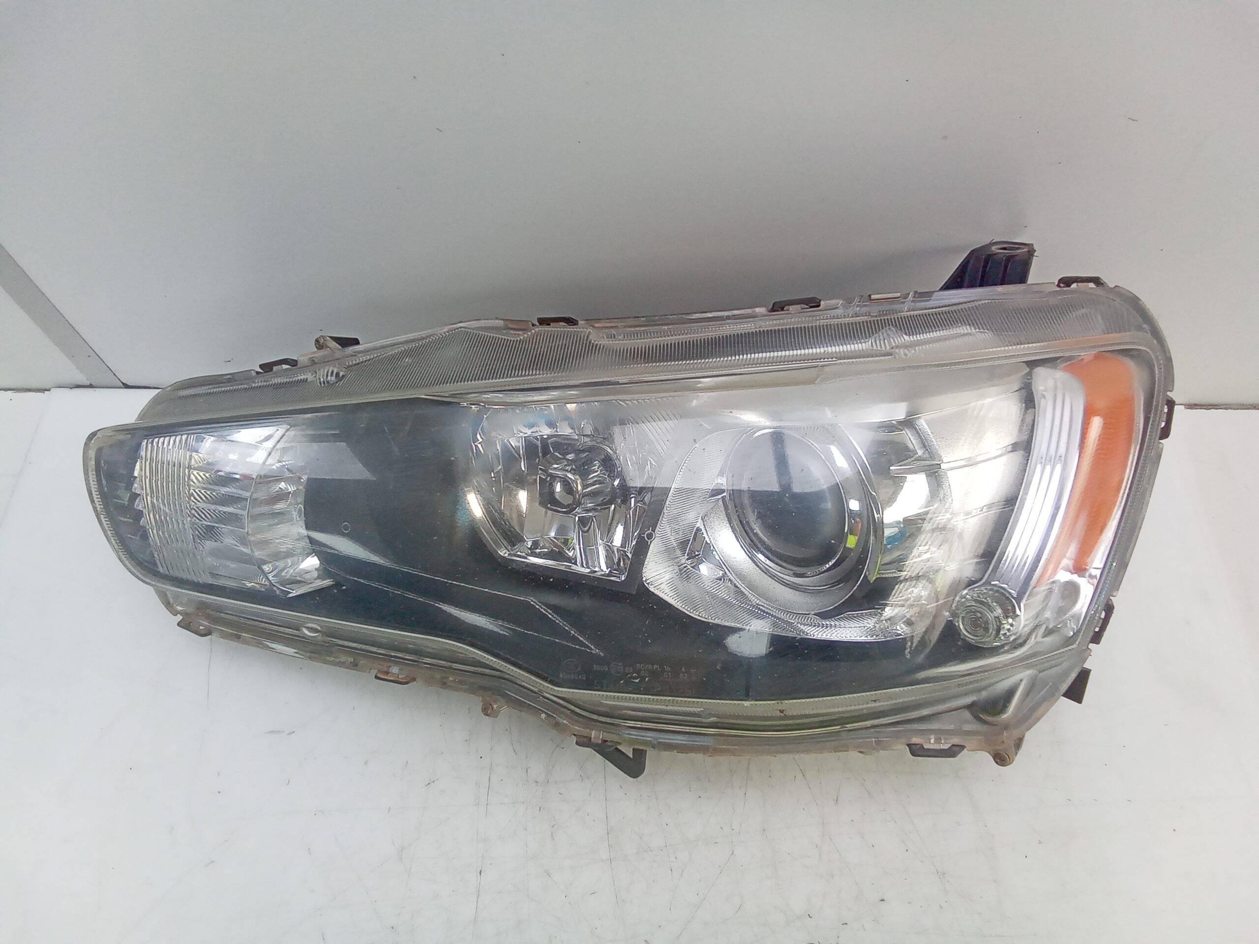 Faro izquierdo mitsubishi lancer berlina (cy0)(2007->)