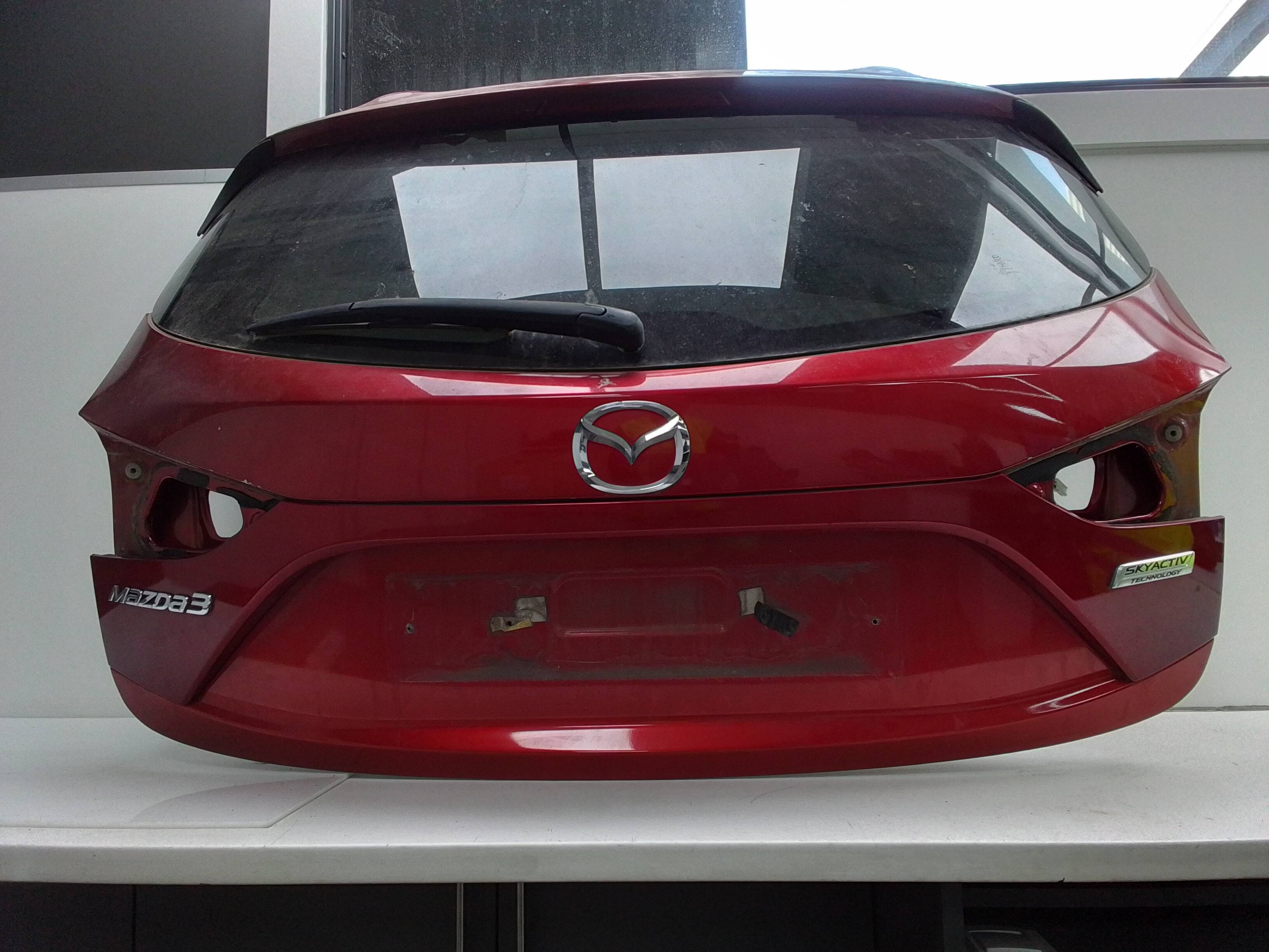 Porton trasero mazda 1813