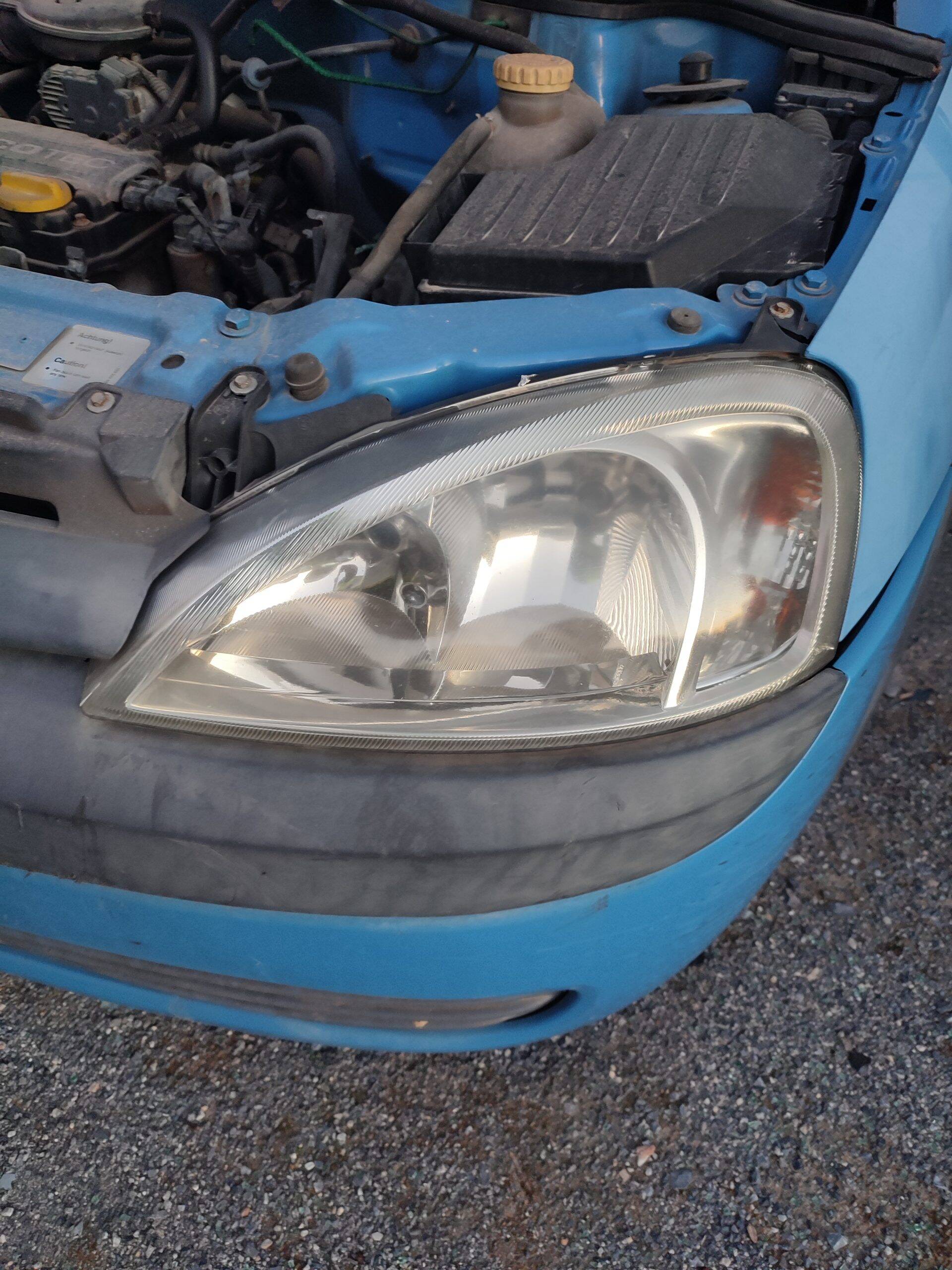 Faro izquierdo opel corsa c (2003->)