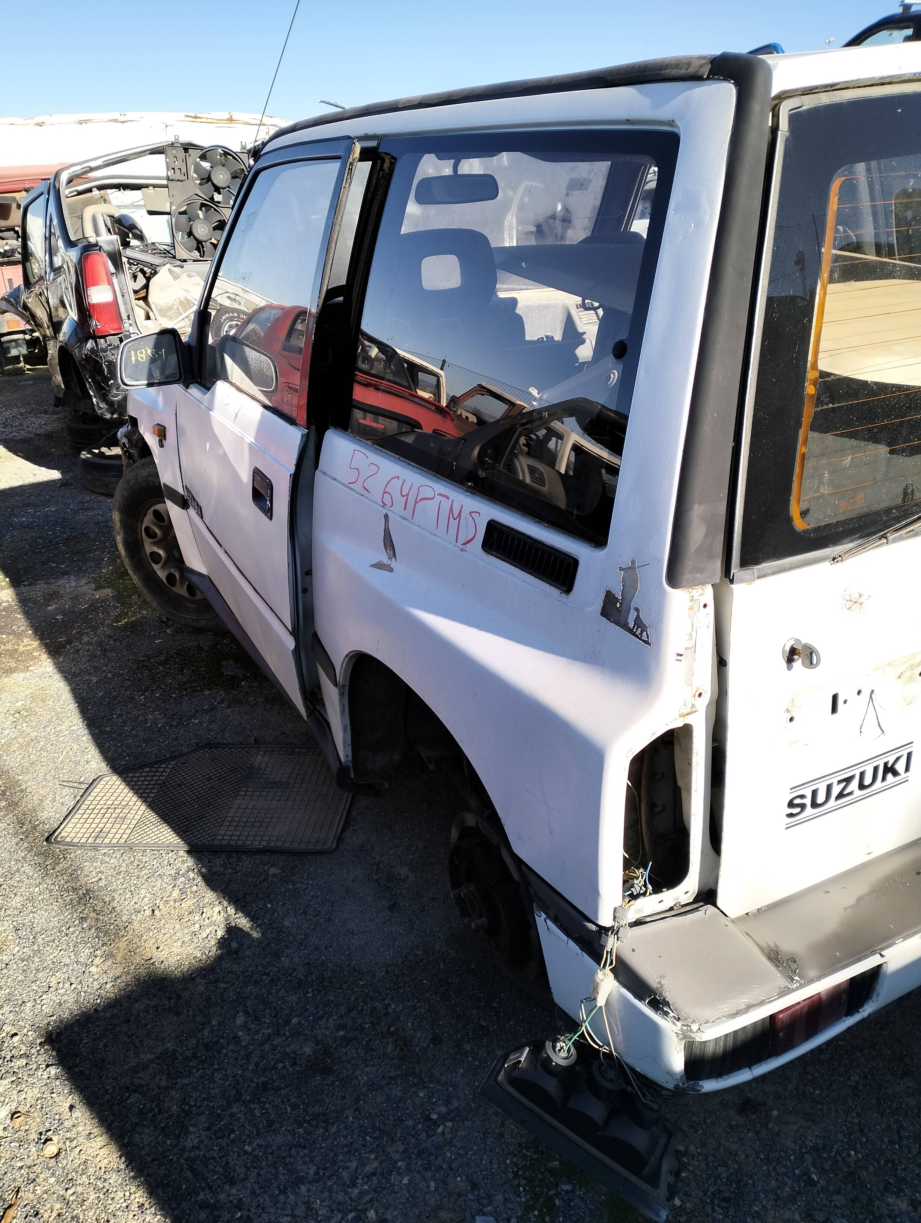 Cerradura puerta delantera izquierda suzuki vitara (se/sf/et)(1988->)