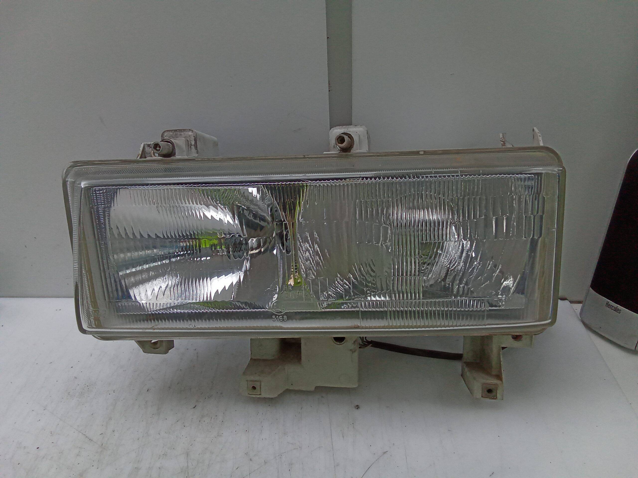 Faro izquierdo mitsubishi canter 01/96 ->