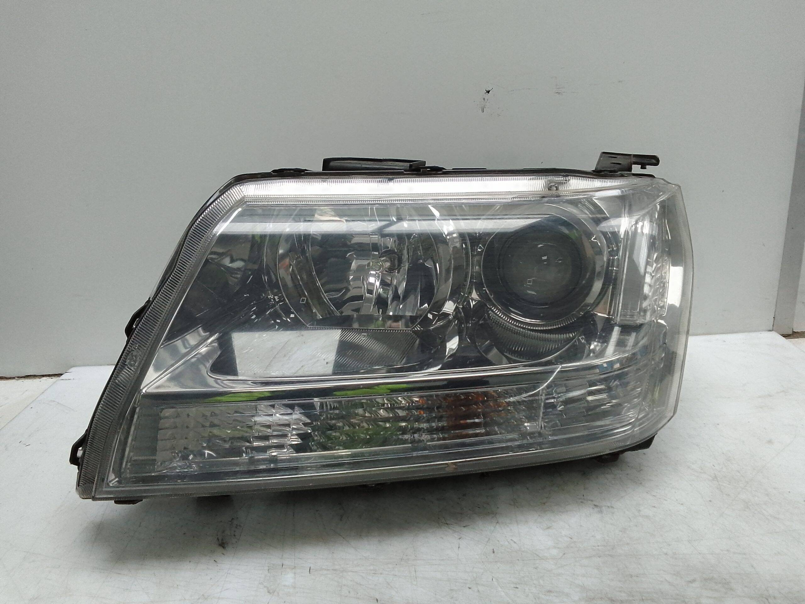 Faro izquierdo suzuki grand vitara (jb/jt)(2005->)