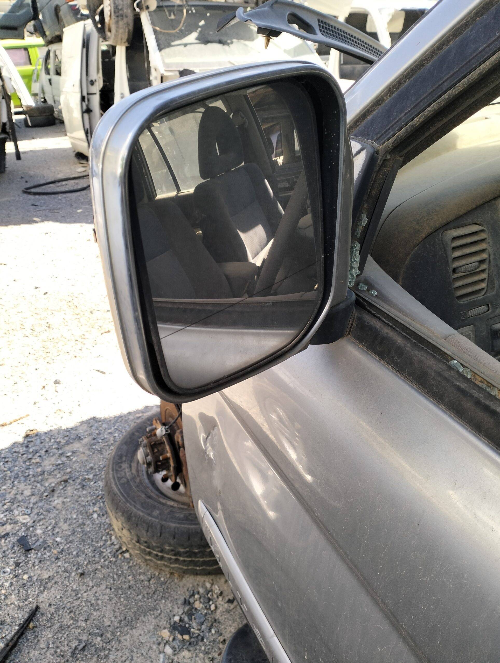 Retrovisor izquierdo mitsubishi montero sport (k90)(1999->)