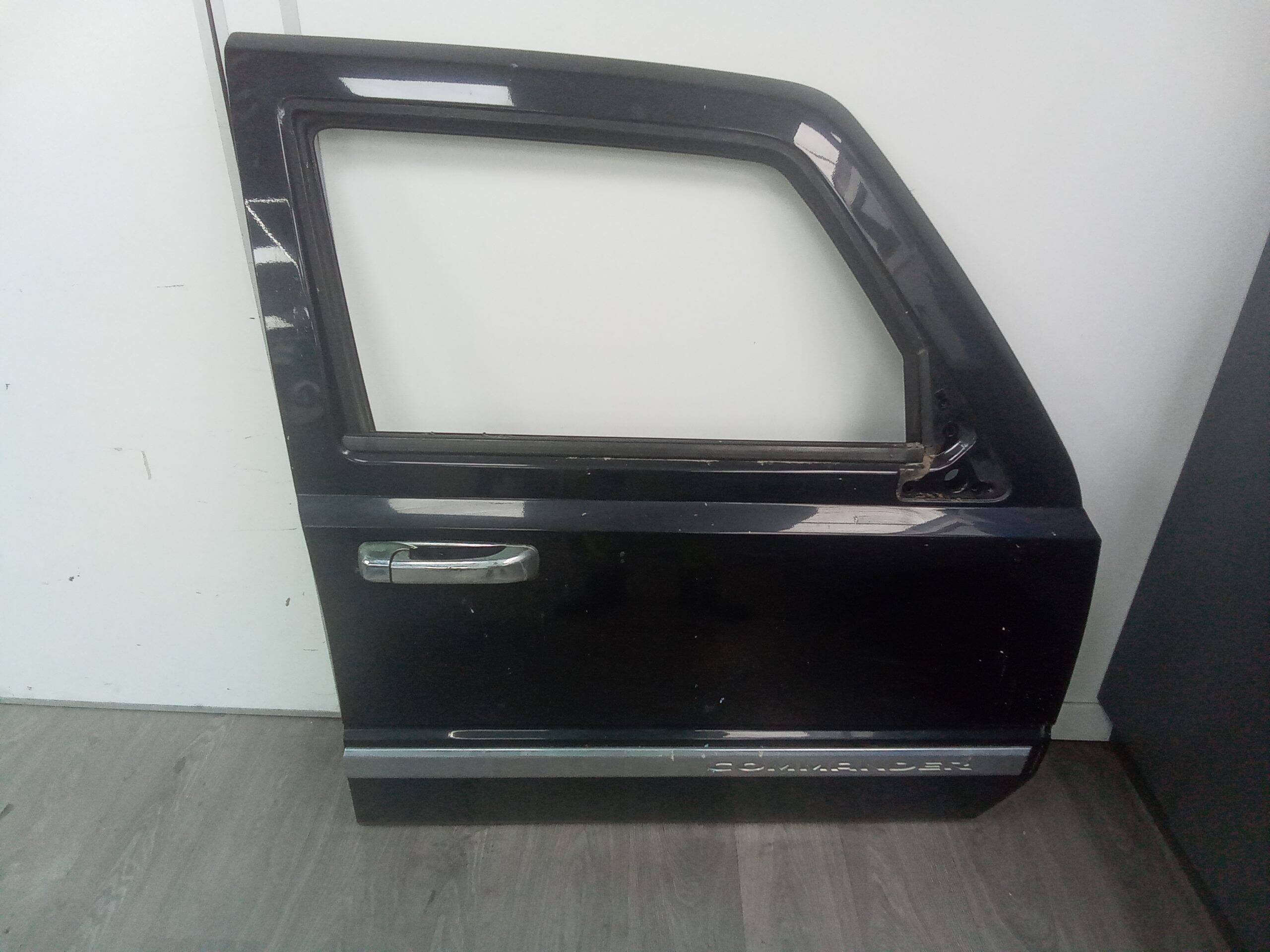 Puerta delantera derecha jeep commander (xh/xk)(2006->)