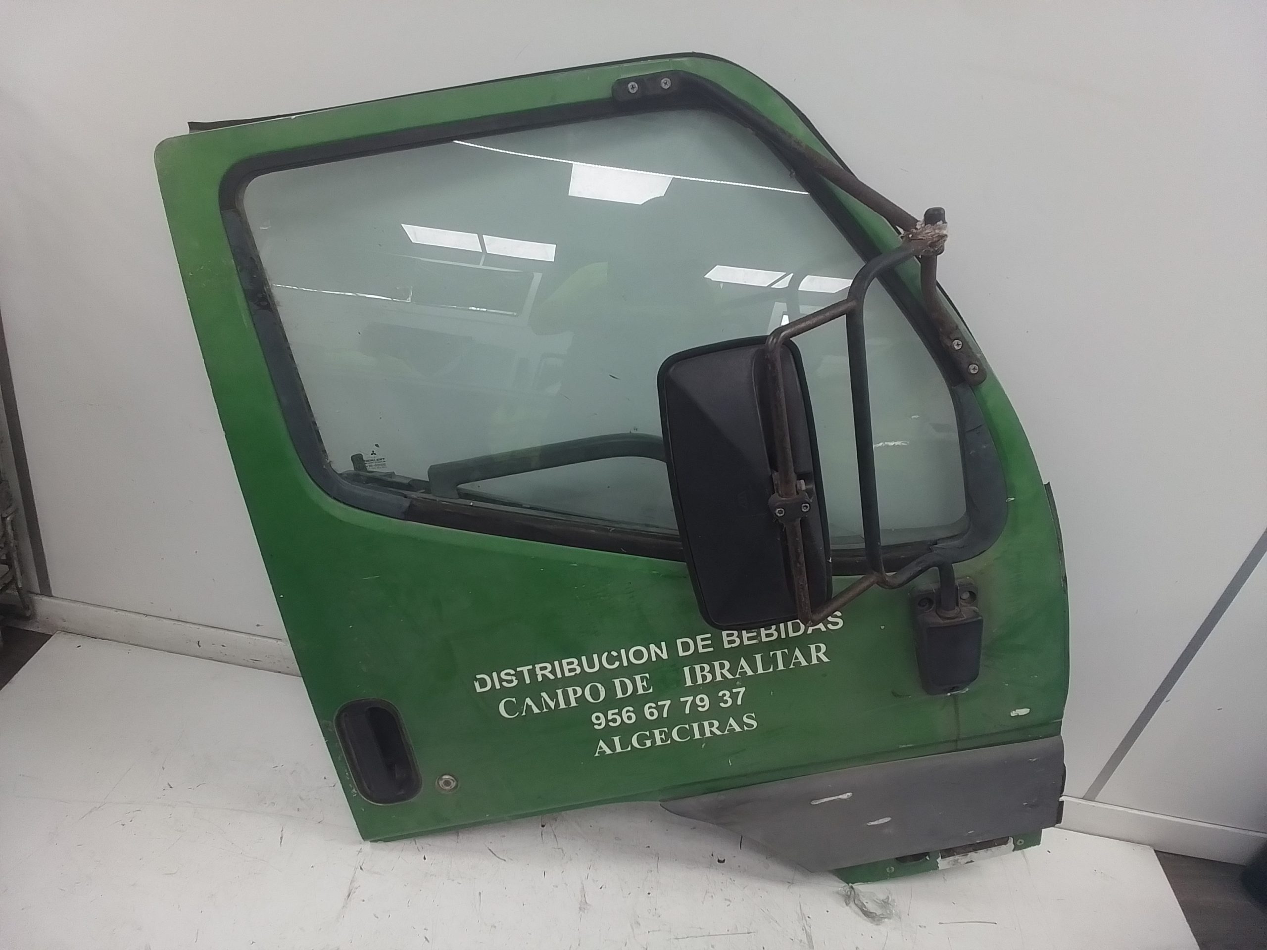 Puerta delantera derecha mitsubishi canter 01/96 ->